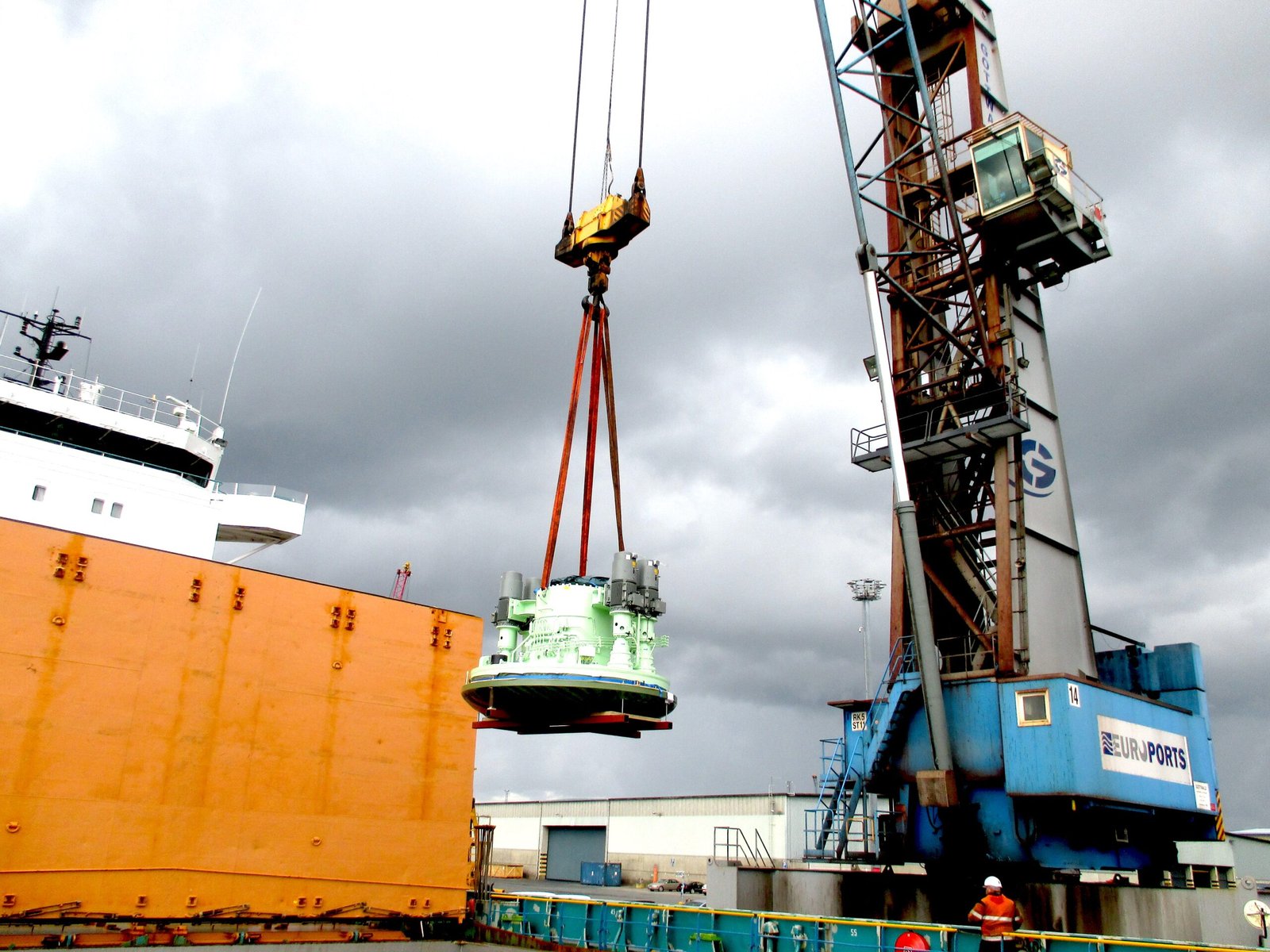 heavy cargo lifting operation at port terminal