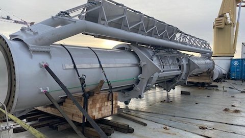 Oversized industrial structure secured on deck of liner vessel — breakbulk cargo transport by Enkel Logistics.