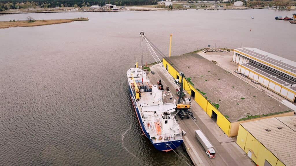 Liner shipping being loaded at port with oversized and heavy cargo to Norway