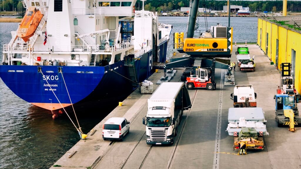 6 m wide platforms being reloaded from trailer onto ship's board