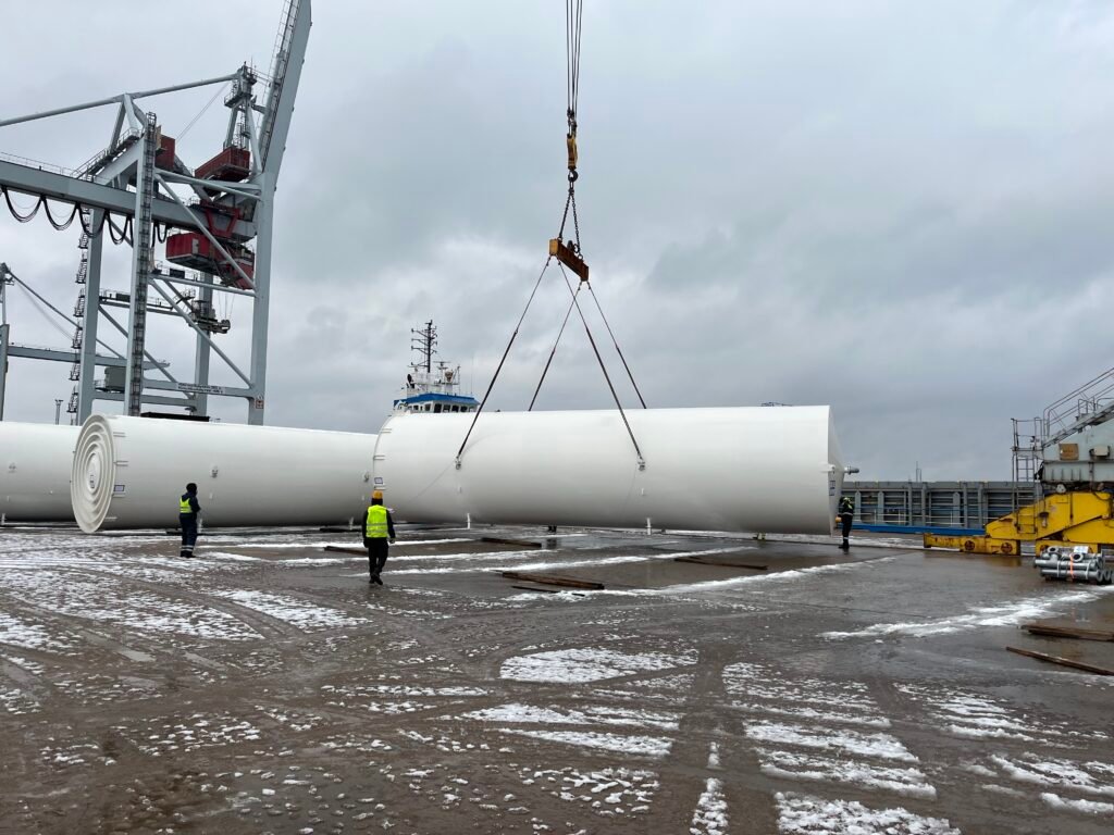 large and heavy steel tanks are being loaded on board the ship in Estonia