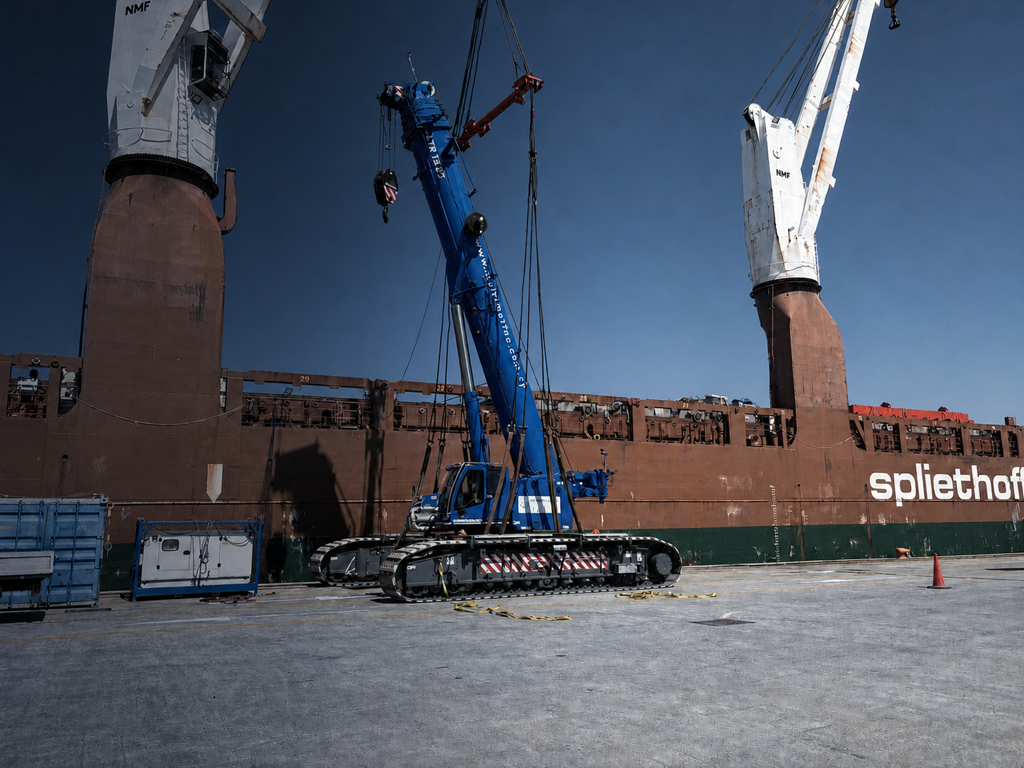 100 ton cargo (Liebherr crane) being prepared for lifting on breakbulk ship.