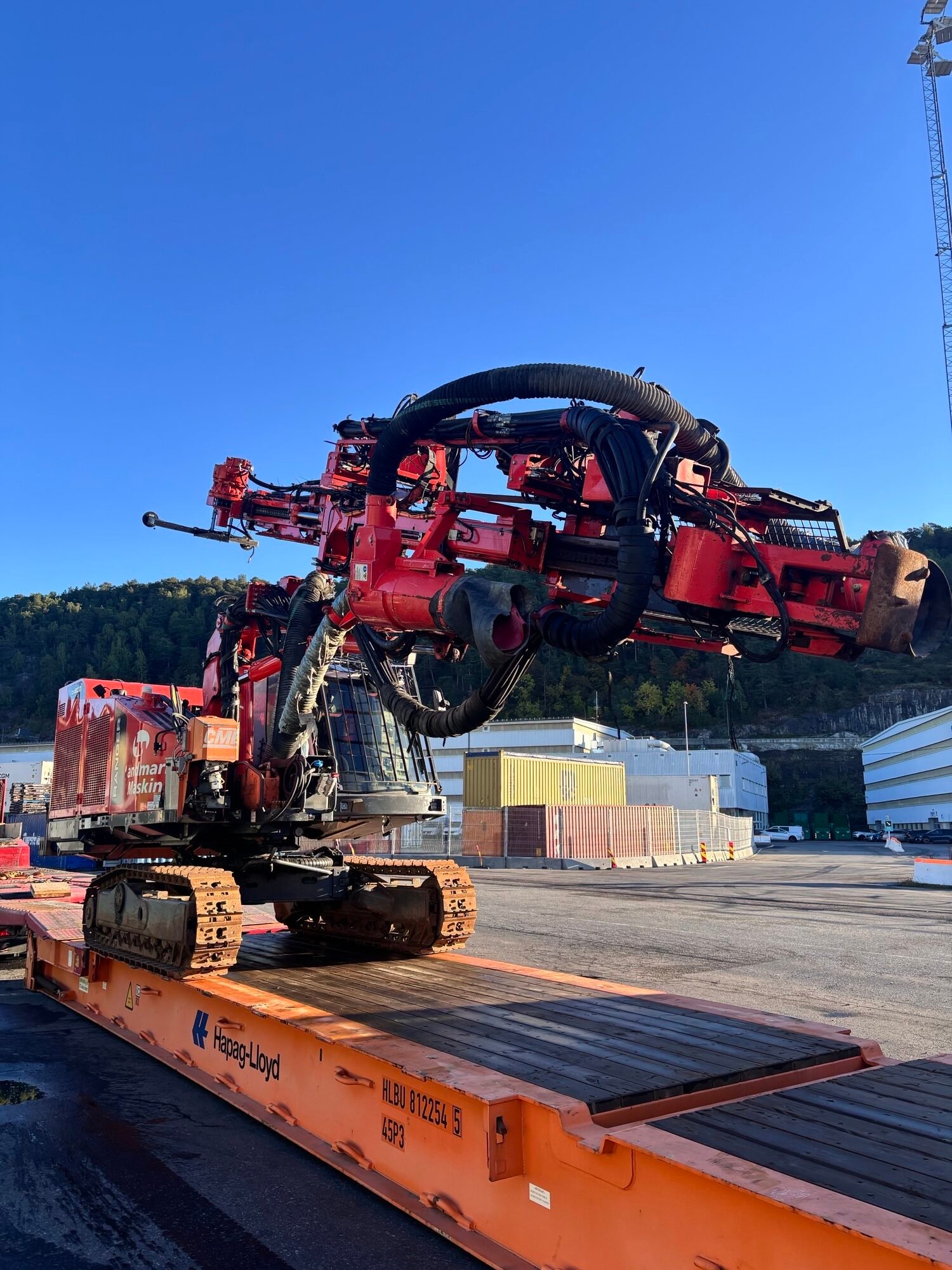 Sandvik DX800 drilling rig being driven onto a flat-rack at the Oslo terminal