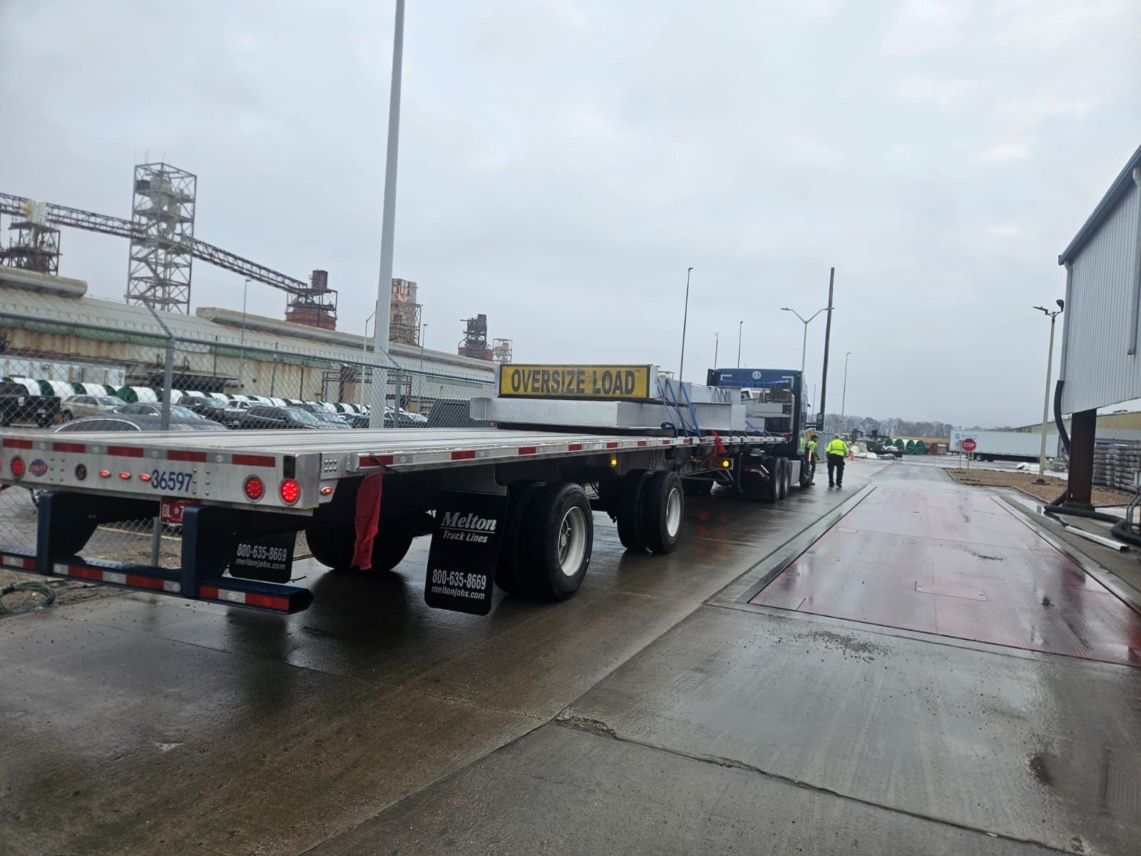 Oversized furnace steel fabrications arriving on a flatbed trailer at the Marston, Missouri project site